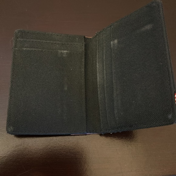The Herschel Supply Co Brand Trade Mark ID cardholder. Fair condition. - Picture 3 of 4